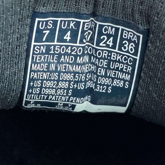 Skechers Black and White Athletic Shoes - Picture 12 of 12